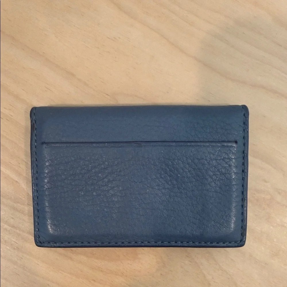 Dagne Dover Blue Leather Card Accordion Holder with Gold Emblem